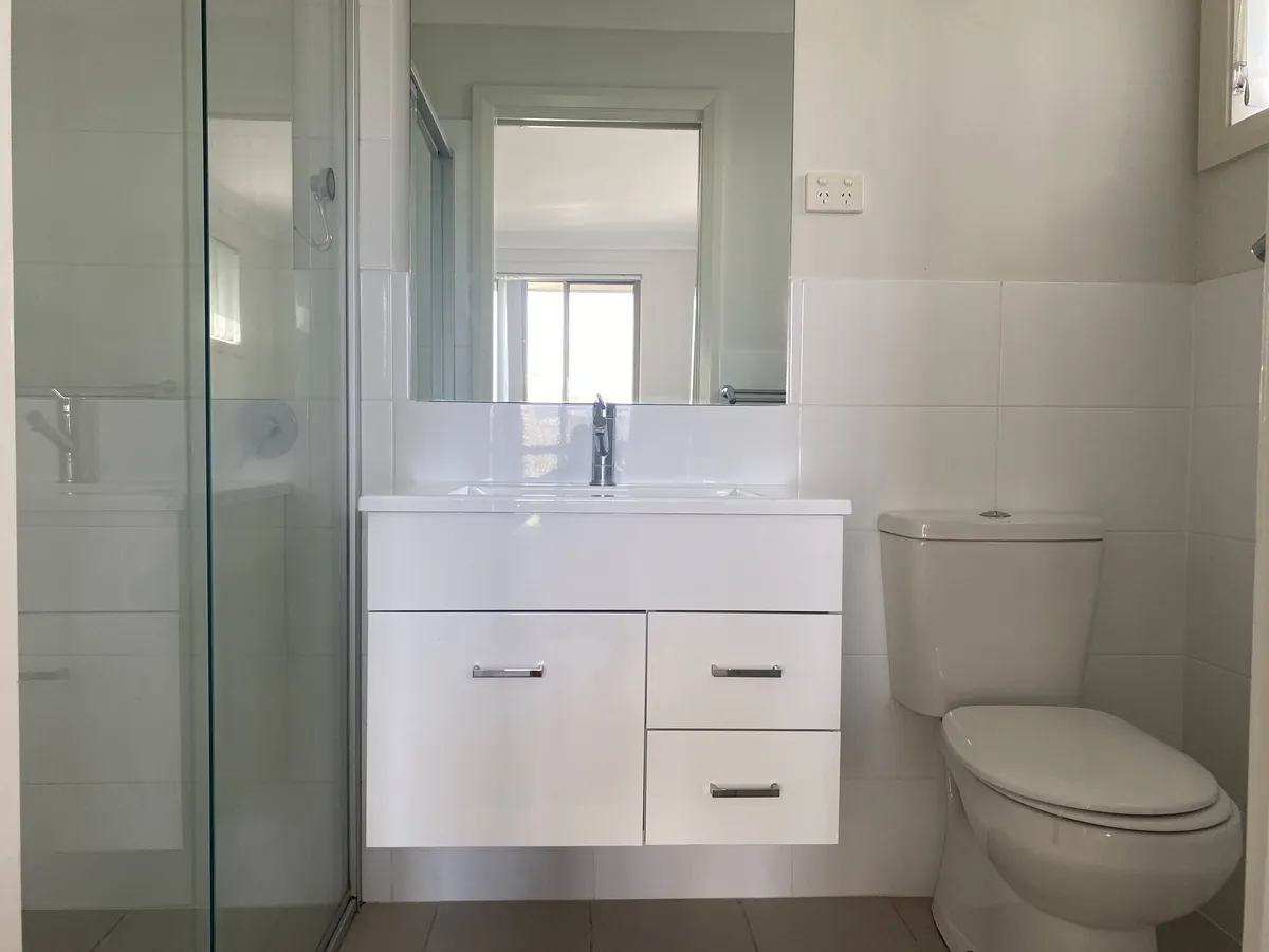 Vanity, shower and toilet