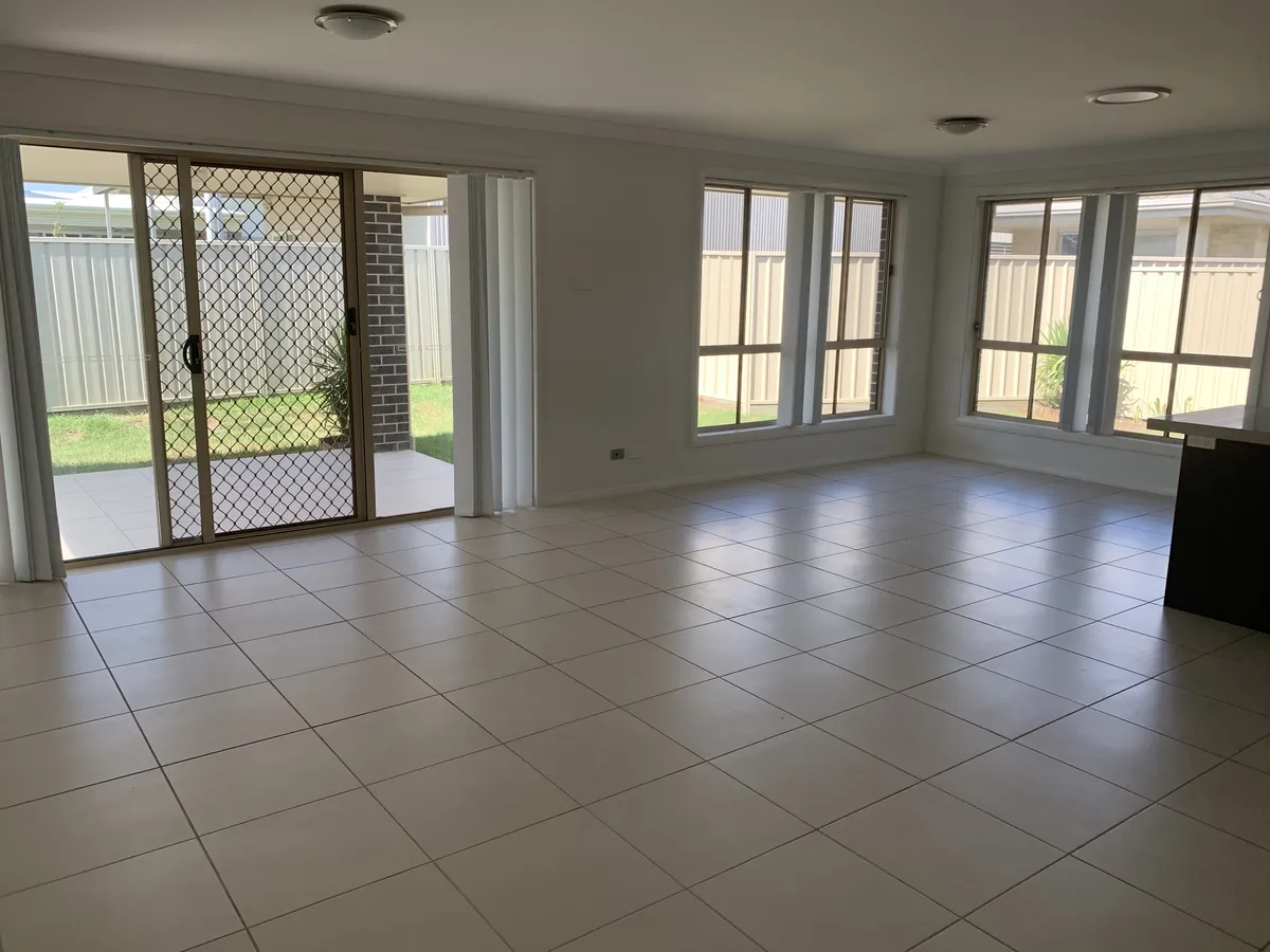 Open plan living with sliding door to the alfresco