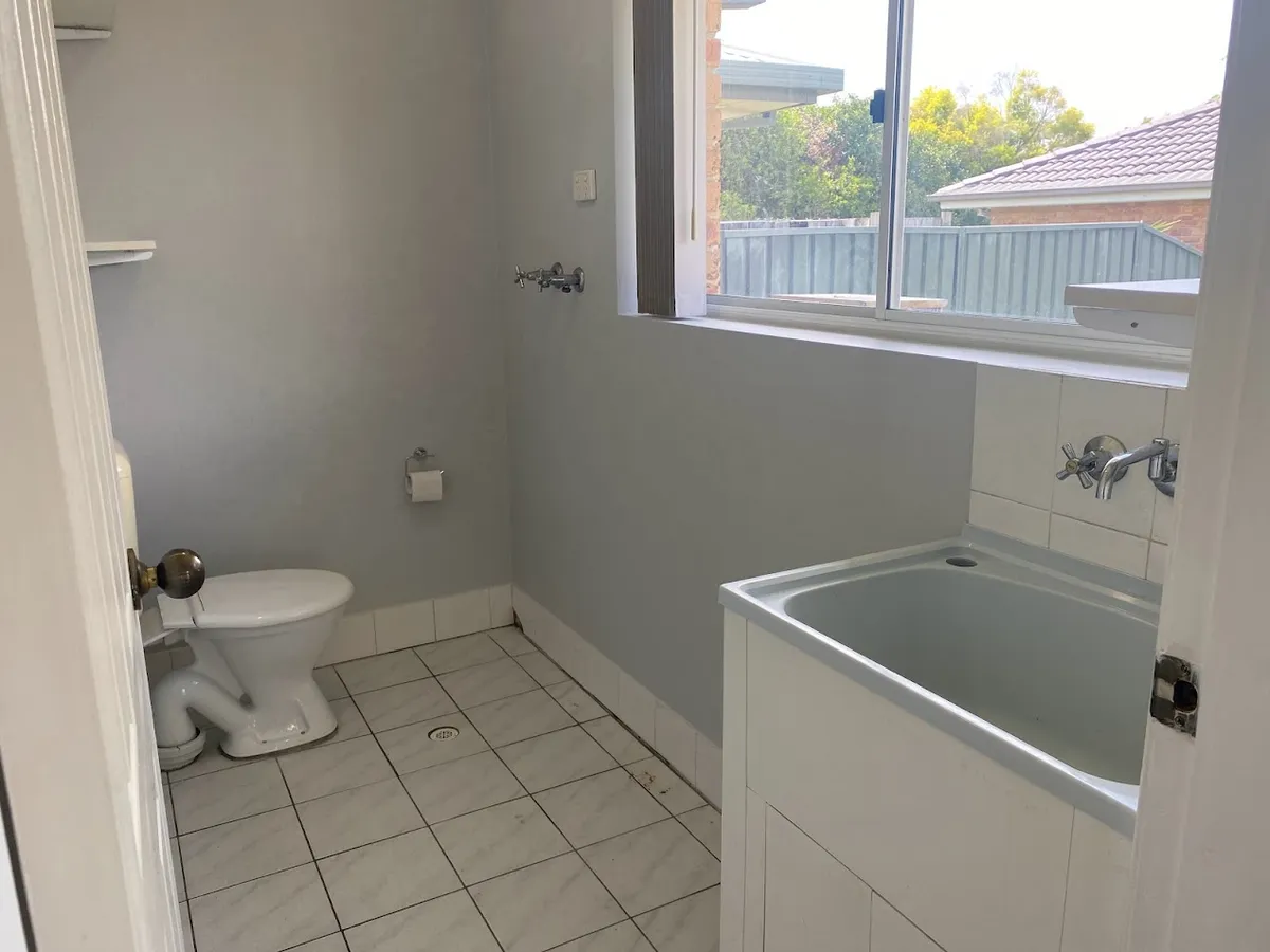 Laundry with second toilet