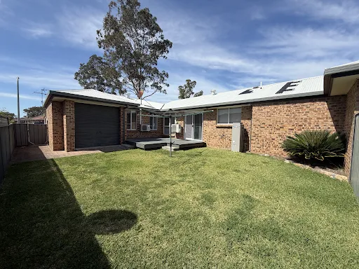Backyard and rear of the home