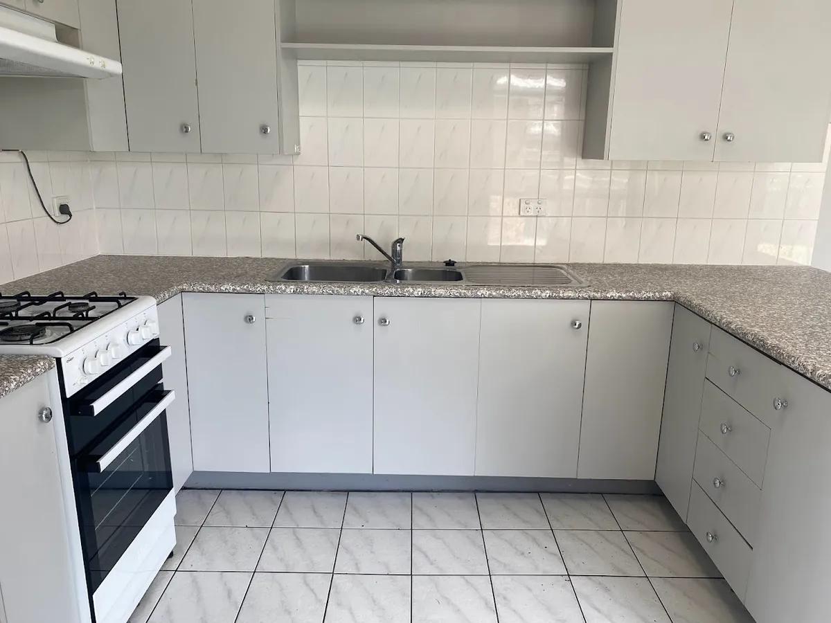 Kitchen with gas cooktop and oven